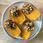 Honeynut Squash Stuffed with Mushrooms, Chickpeas, Pistachios & Cranberries